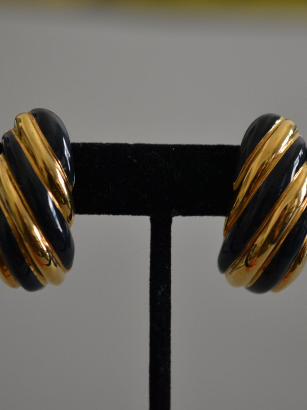 Vintage St. John Black Enamel Gold Tone Clip-On Earrings Ribbed Twist 1.375"